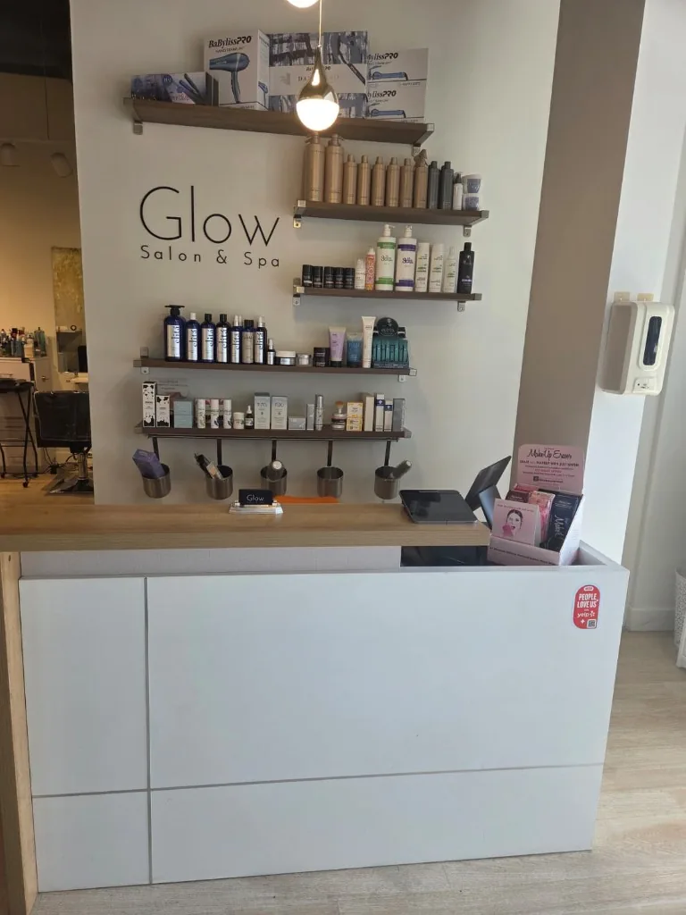 Glow Salon & Spa reception desk and retail shelves on Chatsworth Street